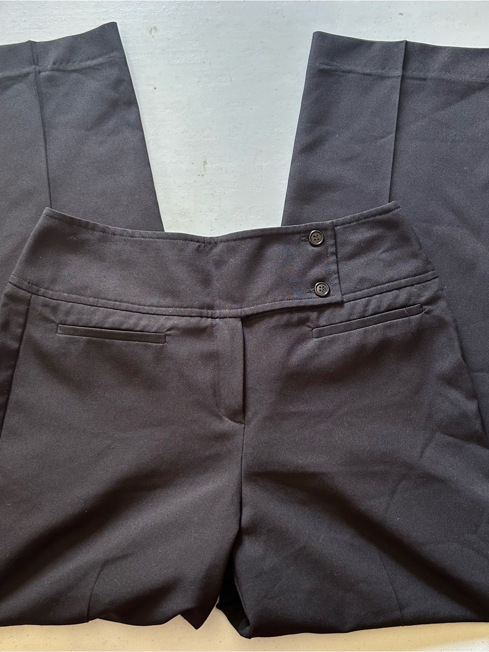 Larry Levine Sport black polyester pants with button detail, size 6